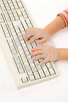 Child hand and Keyboard