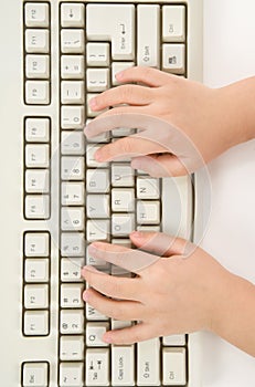 Child hand and Keyboard