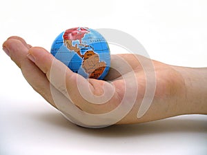 Child handing a globe.