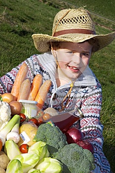 Child with harvest vegetables