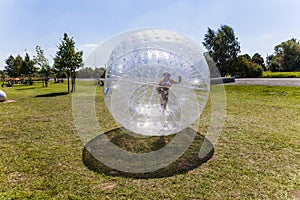 Child has fun in the Zorbing Ball