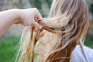 The child has uncombed hair