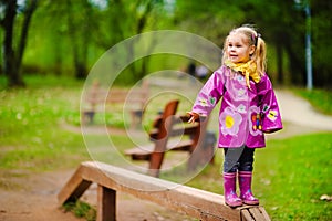 child have fun playing at a playground.