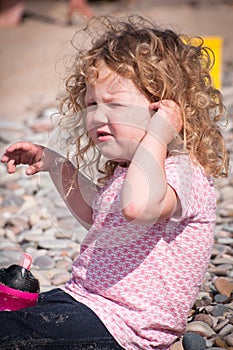 Child having summer fun on the beach