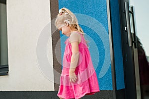 Child head with cochlear implant hearing aid. Hearing aid and medicine innovating technology and diversity Inclusion and