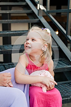 Child head with cochlear implant hearing aid. Hearing aid and medicine innovating technology and diversity Inclusion and