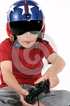 Child in helmet playing a flight simulator