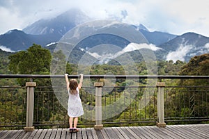 Child hiking in mountains