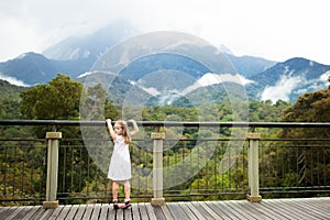 Child hiking in mountains