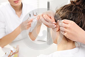 Child with his mother at the ENT doctor.