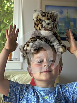 Child with his snugglebun a leopard