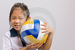 Child Holding Ball, Isolated on White