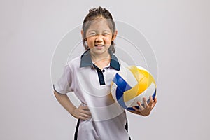 Child Holding Ball, Isolated on White