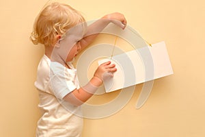 Child holding blank placard