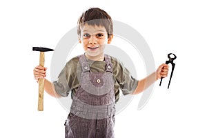 Child holding carpenter tools