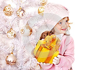 Child holding Christmas gift box.