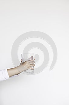 Child holding a glass of milk