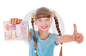 Child holding passport.