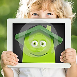 Child holding tablet PC