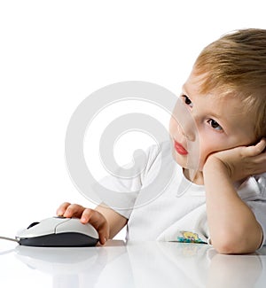 Child holds the computer mouse