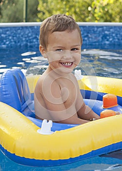 Child in home swimming pool