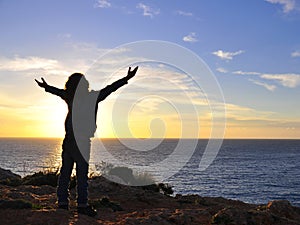 Child hugging the sun