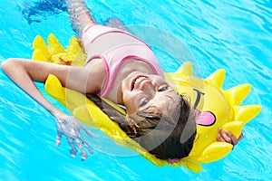 Child on inflatable ring .