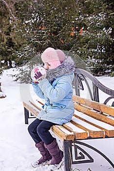 Child inflates ball