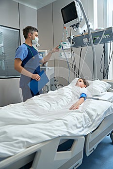 Child in intensive care on breathing support in clinic