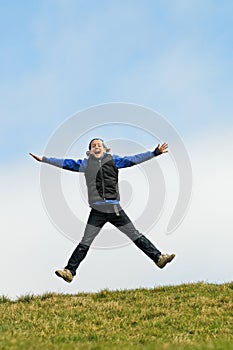 Child jumping for joy