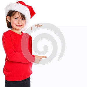 Child kid girl Christmas Santa Claus pointing empty banner copyspace