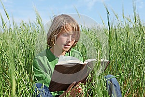 Child or kid reading book