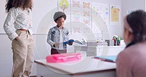 Child, kid reading and classroom with talking speaker, book and education at a school. Students, learning and notebook