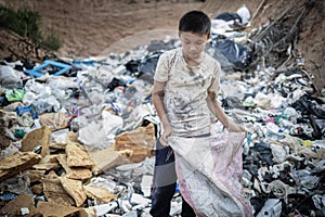 Child labor. Children are forced to work on rubbish. Poor children collect garbage. Poverty, Violence children and trafficking