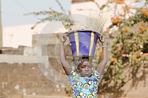 Child Labour Concept - Little African Girl Working for her Family