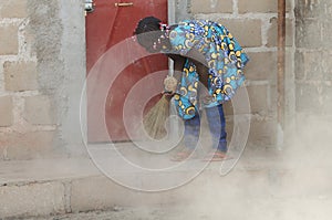 Child Labour - Little African Girl Cleaning - Human Rights Issue