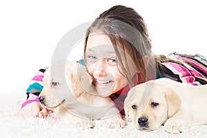 Child and labrador puppy