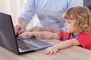 Child and laptop