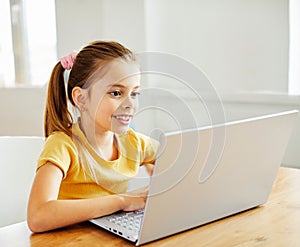 child laptop computer technology home girl education homework kid learning internet childhood student sitting connection