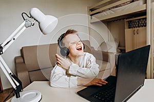 Child laugh home school quarantine online technology