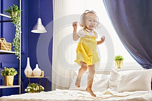 Child laughing and jumping