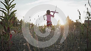 A child launches a toy plane