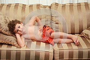 Child laying on sofa