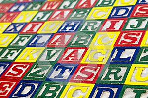 Child learning abc spelling blocks background