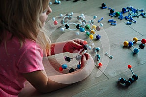 Child learning chemistry, building benzene ring, engineering and STEM