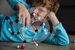 Child learning chemistry, building benzene ring, engineering and STEM