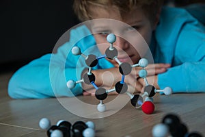 Child learning chemistry, building benzene ring, engineering and STEM