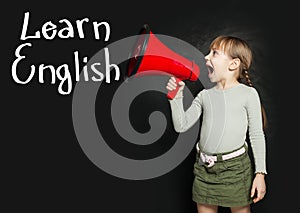 Child learning English language and screaming through a megaphone Learn English