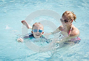 Child Learning to swim photo