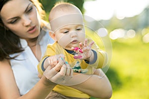 Child learns a little flower